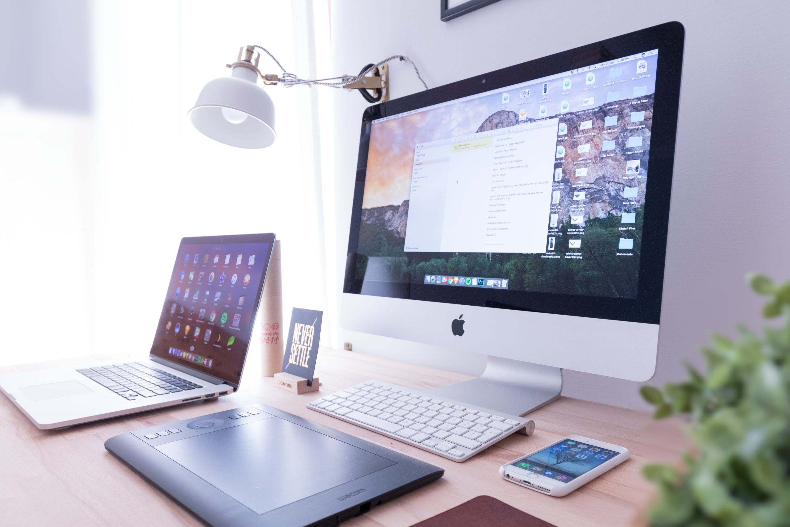 Computer on a desk showing a website